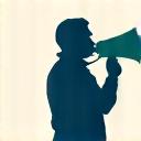 メガホンを持つ人物のシルエット